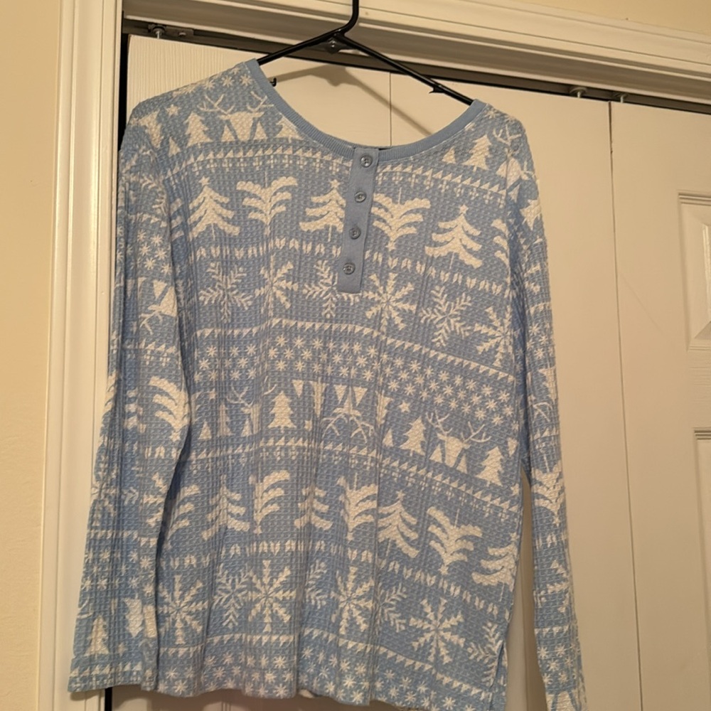 Blue and white long sleeved top